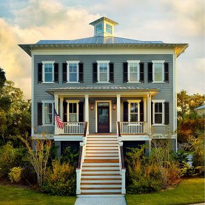 Home built with an elevated coastal cottage floor plan